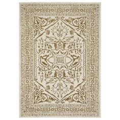 a beige and brown rug with an intricate design on the bottom, in front of a white background