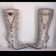 Brand New With Tags Never Been Worn Python Snake Hand Printed With Gold Flake Excellent Used Condition High End Items For Less Pointed Tips Made In Italy Luxury Gold Boots, Luxury Snip Toe Evening Boots, Luxury Snip Toe Boots For Evening, Designer Snip Toe Boots For Party, Elegant Silver Snip Toe Boots, Elegant Gold Formal Boots, Luxury Snip Toe Boots For Galas, Designer Gold Pointed Toe Boots, Luxury Silver Winter Boots