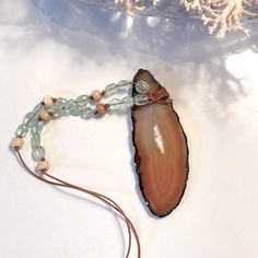 Welcome To My January Jewelry Sale! Item: Handmade Agate Slice ( Sourced From The Oregon Coast) Leather Beaded Necklace ! Msg Me To Custom Bundle Jewelry Items & Save! Handmade Agate Beaded Necklaces With Nature-inspired Style, Handmade Agate Beaded Necklaces Nature-inspired, Handmade Agate Beaded Necklace, Nature-inspired, January Jewelry, Leather Beaded Necklace, Black Leather Necklace, Handmade Beaded Necklace, Princess Necklace, Vintage Beads Necklace