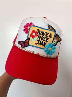 This custom made trucker patch hat is perfect for any occasion whether it be for spring/summer time, a lake hat, a gift for someone, or just a cute accessory to add a little spice to your outfit 🧢✨ DETAILS-  * This hat is one size with an adjustable SnapBack that is adjustable from 20in. - 23.5in. * The color of this hat is Red White * The material of the hat is polyester with iron on patches  REFUNDS AND CANCELLATIONS- Every hat is handmade by me as a result, a slight variation can occur from the picture with patch size or placement. If you have any problems with your hat please message me within 24 hours of receiving your order and I'd be happy to help! No refunds or exchanges will be accepted after. CONNECT- To enter giveaways, discount codes, or behind the scenes, follow our pages. 📲 Disney Trucker Hat, Vintage Snapback Hat For Summer Beach, Vintage Snapback Hat For Beach In Summer, Vintage Adjustable Trucker Hat For Summer, Vintage Beach Hat With Curved Bill, Vintage Curved Bill Beach Hat, Spring Beach Trucker Snapback Hat, Trucker Snapback Hat For Spring Beach, Fun Red Trucker Hat For Beach