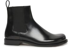 The versatile Terra Boot from Italy pulls adventure in with every step. Featuring a soft black leather, elastic sides for easy on/off, and sturdy 2.5 cm heel, they journey comfortably from city streets to rugged trails. Perfect for the Insta-nomad, their simple yet durable design keeps wanderlust at your feet. Elegant Slip-on Chelsea Boots With Rubber Sole, Sleek Black Chelsea Boots For Formal Occasions, Elegant Black Chelsea Boots With Rubber Sole, Elegant Formal Slip-on Chelsea Boots, Elegant Slip-on Chelsea Boots In Calf Leather, Elegant Black Chelsea Boots With Rubber Heel Cap, Elegant Black Chelsea Boots For Galas, Jm Weston, Espadrilles Sneakers