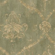 an old wallpaper with gold and green designs on the side, in shades of grey