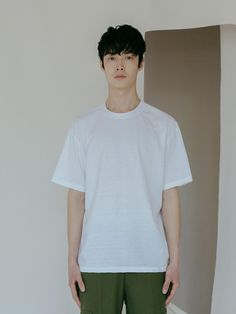 Editor's NoteThe must-have, basic t-shirt features semi-oversized fit and soft touch- Short sleeve t-shirt made of modal fabric that features quality and soft touch- Round neckline- Relaxed fit- Dropped shoulderMeasurements (in.)- M:       Length     27.6in.,        Shoulder     7.9in.,        Chest     21.7in.,        Sleeve     8.3in.             - L:        Length     28in.,        Shoulder     20.5in.,        Chest     22.5in.,        Sleeve     8.7in.              - XL:        Length     28.4in.,        Shoulder     20.9in.,        Chest     23.3in.,        Sleeve     9.1in.*Model Info- 6' 01, 157lbs, Wearing size LComposition & Care- 52% Cotton, 48% Polyester- Dry clean or hand wash- There may be possibilities for staining if you wash and wear the product with a combination Classic Oversized T-shirt For Summer, White Relaxed Short Sleeve T-shirt, Relaxed Fit T-shirt For Everyday, White Classic Boxy Fit T-shirt, Classic Oversized T-shirt For Spring, Simple Boxy Fit T-shirt For Everyday, Minimalist Relaxed Fit T-shirt, White Boxy Fit Minimalist Top, Classic Boxy Fit T-shirt For Summer