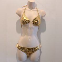 Tried On But Never Worn. Gorgeous Still Looks New. Fabulous Gold Color Size 2 Top And Bottom Questions? Leave A Comment Below! Metallic Fitted Swimwear For Beachwear, Fitted Metallic Swimwear For Beach, Metallic Fitted Triangle Top Swimwear, Gold Festival Swimwear, Gold Triangle Top Swimwear For Festivals, Gold Fitted Triangle Top Swimwear, Fitted Gold Swimwear With Triangle Top, Fitted Gold Triangle Top Swimwear, Gold Fitted Swimwear For Beach Season