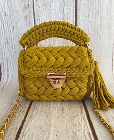 Handwoven bag,handmade bag,Bag,Hand Knitted Bag,Hand Woven Bag,Bag,Knitted Bag,Crochet Bag,Women's Bag,Shoulder bag,Black bag,Luxury Bag,Designer Bag,White bag,Crochet Handmade Bag    Handmade Knitted Crochet Bag made with cotton yarn. This stylish purse is available with lots of color options!   Size: 9x8 Inches - 23x20 Centimeters ★ Discover all our products here:     https://www.etsy.com/shop/mutlubagstore  If you want another color or size don't hesitate to send me a message with your preference!  Be sure that all items are made and stored in a smoke free environment. ->Do not wash. Clean it carefully with a damp sponge ->Note that actual colors may vary due to different displays. ->Feel free to message me for further details Custom orders are welcomed. Thank you for visiting my shop Designer Bags Black, Beige Birthday, Hand Knit Bag, Handwoven Bag, Knitted Bag, Womens Bag, Stylish Purse, Luxury Bag, Bag Luxury