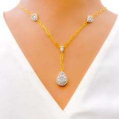 Emanating luxury and sophistication, this 18k yellow gold necklace, with a substantial weight of 9.1 grams, exquisitely showcases a radiant interlinked drop design. It boasts an impressive 0.84 carats of G-H color, VS clarity round and baguette-cut diamonds, creating a dazzling spectacle. The elongated 1.5-inch drop pendant adds an extra dimension of elegance to this piece. With a generous 20-inch length and 2.5-inch adjustable link segment, this necklace offers both style and versatility. PRODU 18k Gold Necklace, Yellow Gold Necklace, Drop Design, Baguette Cut Diamond, Baguette Cut, Drops Design, Drop Pendant, Spectacles, Diamond Cuts