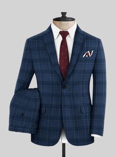 Exude confidence when you step out in our Reda Vale Blue Checks Wool Suit. Made from virgin wool, which breathes easily and is durable, this suit is a masterful combination of poise, style, and quality. With its beautiful blue shade and subtle plaid weave, it will give you a sharp and suave look. This versatile suit can be worn for formal evening events or even high-class meetings!  Look Includes    Reda     Vale     Blue     Checks     Wool  Fabric  Two Button Jacket Style  Notch Lapel   Horn R Blue Three-piece Suit With Welt Pockets For Business Casual, Tailored Blue Wool Suit, Blue Wool Suits For Work, Blue Wool Suits For Workwear, Blue Three-piece Suit With Welt Pockets For Work, Blue Suits For Business Casual, Blue Custom Fit Suit For Business Casual, Custom Fit Blue Suit For Business Casual, Blue Business Casual Suiting Sets