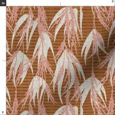 an orange and white fabric with pink leaves on the front, and brown back ground