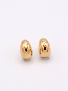 Get ready to elevate your earring game with our Big Bean Studs. These bold and fun studs are a popular style, adding a touch of classic clean style to any outfit. With their unique design, you're sure to turn heads and make a statement. We also love them paired with the Baby Beans as a second piercing pair. Sold as a pair. Earring back included. Metal: 14K Gold Vermeil or Sterling Silver Second Piercing, Morse Code Bracelet, Moms Favorite, 50th Gifts, Gift Card Shop, Jewelry Case, Earrings Collection, Huggies Earrings, Earring Backs