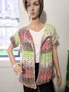 This handmade Crochet Jacket is made with very high-end yarn. I have made the wonderful summer cardigan Noro Kagayaki. Cardigan is made from  Designed by The Dream.  JThe Cardigan is very soft and cozy the lightweight yarn makes this great to wear this upcoming season.  The Multicolor yarn makes this cardigan extra special,  great to wear for those special occasions or for every day.   I have it pulled back on the mannequin so you can see better how it would look. Please Note: Mannequin is a siz Casual Hand Knitted Spring Cardigan, Handmade Casual Cardigan For Spring, Spring Casual Handmade Cardigan, Spring Knitted Yarn Sweater, Spring Knit Yarn Sweater, Casual Crochet Cardigan For Spring, Casual Knit Yarn Cardigan, Spring Casual Crochet Cardigan, One Size Casual Yarn Cardigan