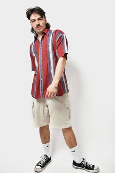 🔥BLACK FRIDAY deals now live! Discounts from 20% to 70% off sitewide! Don't miss your chance and size! All clothing is vintage and one-of-a-kind! Selling fast! 👀Read full item description below. 90s style striped cotton button up short sleeve shirt in red blue multi colour. Size - M. Model is 177 cm / 5ft 9.6" tall and usually wears size M. Very good condition. Only 1 available! All orders are shipped every day Worldwide from 🇪🇺EU. Safe registered standard delivery with courier and tracking Striped Short Sleeve Shirt With Pockets, Red Cotton Camp Shirt For Summer, Casual Short Sleeve Shirt With Vertical Stripes, Cotton Shirt With Vertical Stripes For Summer, Red Casual Short Sleeve Shirt For Summer, Summer Striped Button-up Camp Shirt, Casual Red Short Sleeve Shirt For Summer, Summer Cotton Shirt With Vertical Stripes, Striped Cotton Short Sleeve Shirt