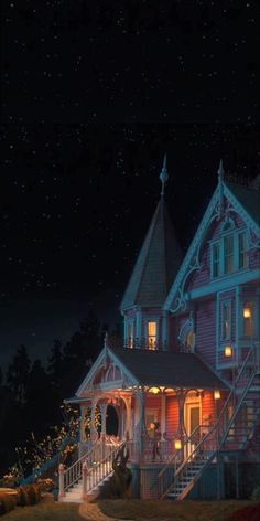 the house is lit up at night with christmas lights on it's porch and stairs