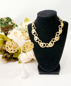 Gorgeous goldtone luxury vintage costume jewelry by Erwin Pearly,  vintage 1980s Lovely choker necklace and matching clip on  earrings in a gold color filigree pattern.  This would be lovely for a bride, mother-of-the-bride, maid-of-honor gift, anniversary  gift. The necklace/choker is about 16" around,  the earrings  about 1" in  diameter. Vintage condition: Excellent Definitions of Stated Condition: MINT/PRISTINE: The item appears practically new or unused. Sometimes tags or original packing a Vintage Gold Metal Jewelry Sets, Gold Costume Jewelry Sets For Evening, Vintage Gold Necklaces With Matching Earrings, Vintage Gold Necklace With Matching Earrings, Vintage Gold Jewelry Sets For Wedding, Gold Costume Jewelry Necklace For Vintage Events, Vintage Gold Jewelry Sets For Party, Vintage Gold Jewelry Sets For Anniversary, Vintage Gold Jewelry Sets For Formal Occasions