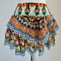 Gorgeous Ruffled Mini Skirt By Camilla In 100% Silk With Crystals. Beautiful Print And Colors. Features A Back Zip And No Stretch. Purchased For $500, Happy Shopping! Orange Skirt For Summer Vacation, Summer Orange Skirt For Vacation, Bohemian Orange Floral Print Skirt, Orange Tiered Summer Skirt, Orange Mini Skirt For Beach In Summer, Orange Mini Skirt For Summer Beach, Orange Lined Skirt For Vacation, Summer Beach Orange Mini Skirt, Bohemian Orange Skirt For Vacation