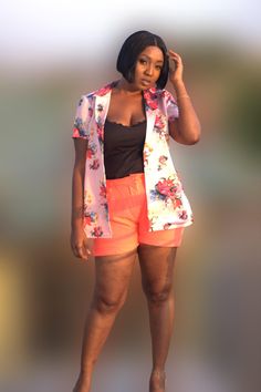 Elevate your casual look with our women's 2-piece set featuring a flowery pink blazer-style shirt and pint shorts. Handmade in Ghana, this chic ensemble combines elegance with comfort, perfect for brunch or a casual day out. Crafted from soft, breathable fabric, it offers a flattering fit and vibrant style. Available in various sizes Summer Short Set For Day Out, Summer Short Sleeve Short Set For Day Out, Summer Short Sleeve Set For Day Out, Short Sleeve Short Set For Summer Day Out, Summer Short Set With Short Sleeves For Day Out, Short Set For Day Out In Spring, Casual Short Sleeve Short Set For Day Out, Casual Short Set For Spring Day Out, Casual Short Set For Spring