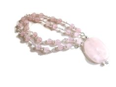 This pink necklace created by Jewelry By Carmal is made of  a pink rose quartz pendant, pink rose quartz gemstones, pink crystals, sterling silver: daisy spacers, spring ring clasp and findings. This necklace measures 17 inches in length and the pendant is 1 1/2 inches. View more chain necklaces:  http://www.etsy.com/shop/jewelrybycarmal?section_id=8001511 All of our jewelry arrives wrapped and ready for gift giving We offer free shipping via USPS within the United States Please see other items Pink Sterling Silver Crystal Gemstone Necklace, Pink Rose Quartz Gemstone Necklaces, Pink Rose Quartz Gemstone Necklace, Feminine Pink Rose Quartz Jewelry, Silver Rose Quartz Jewelry With Gemstone Beads, Silver Jewelry With Rose Quartz Gemstone Beads, Pink Rose Quartz Crystal Necklace With Natural Stones, Pink Gemstone Bead Pendant Jewelry, Rose Quartz Round Beads Jewelry For Valentine's Day