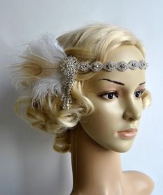 Beautiful Vintage Style flapper headband. Perfect for a vintage inspired bride, 1920's wedding or Great Gatsby party. Lovely stunning rustic hair piece - Vintage inspired - stylish with modern look! Made of : - hight sparke rhinestone headband - a spray of ostrich feathers and hand curles peacock eye - embellished with sparkling Art Deco rhinestone brooch and rhinestone dangling drop Can be worn with feathers on the right side of head, it ties on with satin ribbons. Can be put down on the forehe Gatsby Style Feather Headpieces For Vintage Events, Flapper Style Feather Headpiece For Vintage Events, Flapper Style Feathered Headpieces For Vintage Events, Adjustable Feather Headpiece For Vintage Events, Vintage Adjustable Headpieces With Feathers, Vintage Adjustable Feather Headpieces, Adjustable Gatsby Style Headband, Adjustable Vintage Headpieces With Feathers, Gatsby Style Feather Headband