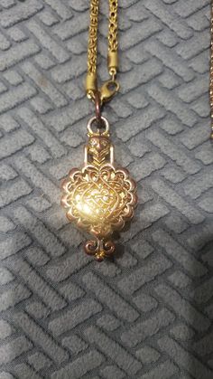 Vintage RARE goldette Victorian revival Gothic pendant locket necklace gold tone Antique Gold Medallion Necklace For Gift, Gold Pendant Locket Necklace With Vintage Charm, Gold Locket Necklace With Vintage Charm, Antique Gold Filigree Locket Necklace For Formal Occasions, Vintage Rose Gold Filigree Necklaces, Vintage Rose Gold Filigree Necklace, Heirloom Gold Brass Locket Necklace, Gold Heirloom Brass Locket Necklace, Heirloom Antique Gold Pendant Necklace