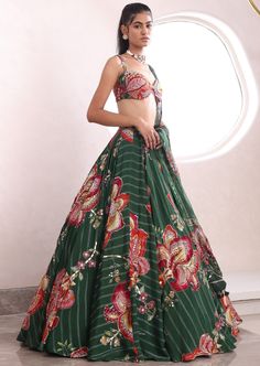 Embroidered lehenga with matching blouse and dupatta. Designer Dresses With Sheer Dupatta And Long Skirt, Designer Long Skirt Dress With Sheer Dupatta, Embroidered Chanderi Choli For Party Wear, Sheer Dupatta Long Skirt Dress For Reception, Festive Palazzo Set With Intricate Embroidery For Party Wear, Festive Palazzo Set With Intricate Embroidery, Festive Embroidered Palazzo Set For Party Wear, Reception Dress With Sheer Dupatta And Long Skirt, Reception Dress With Sheer Dupatta