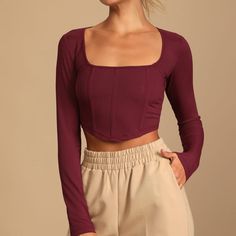 Sold Out Online Fitted Purple Tops For Winter, Winter Purple Fitted Tops, Fitted Purple Winter Tops, Purple Ribbed Stretch Top, Purple Stretch Ribbed Tops, Stretch Purple Ribbed Tops, Stretch Ribbed Purple Tops, Fitted Purple Crop Top For Fall, Chic Purple Long Sleeve Crop Top