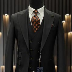 This Modern Fit Suit Features A Wide Peak Lapel, 1 Button Closures, Double Breasted Vest, Side Vents, And Matching Flat Front Pants. 100% Wool, Made In Turkey. Semi-formal Sets With Lapel Collar And Buttons, Semi-formal Sets With Buttons And Lapel Collar, Double-breasted Business Sets With Button Closure, Black Single Breasted Long Sleeve Set, Black Single-breasted Long Sleeve Set, Business Tuxedo Suit With Button Closure, Black Single Breasted Business Casual Sets, Black Single-breasted Business Casual Sets, Black Single Breasted Sets For Business Casual