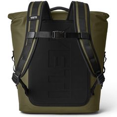 a green and black backpack with straps on the front, two pockets at the bottom