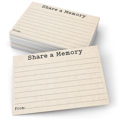 two notepads with the words share a memory written on them