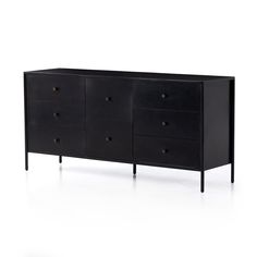 a black dresser with four drawers and three legs