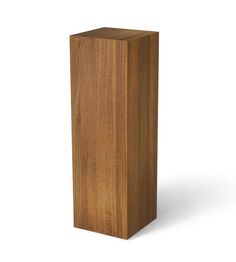 a tall wooden object is shown against a white background and has no image on it