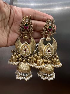 Silver & Gold Jhumka with quartz stone and pearl strings Luxury Kundan Jhumkas, Indian Ethnic Earrings, Luxury Hand-set Jhumkas For Festivals, Luxury Heavy Earrings For Diwali, Luxury Traditional Bridal Earrings For Diwali, Bohemian Cheap Jhumkas For Diwali, Luxury Formal Jhumkas For Festivals, Cheap Handmade Festive Jhumkas, Luxury Cutdana Chandbali Earrings