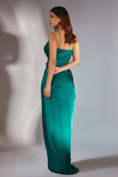 Teal green draped embroidered maxi dress. Paired with a teal green satin organza ombre scarf.
Components: 2
Pattern: Embroidered
Neckline: Sweetheart
Sleeve Type: Sleeveless
Fabric: Gajji Silk
Color: Green
Occasion: Party - Aza Fashions Green Pre-draped Satin Gown, Green Draped Evening Dress For Party, Green Pre-draped Maxi Evening Dress, Pre-draped Green Draped Evening Dress, Green Pre-draped Party Evening Dress, Green Draped Evening Maxi Dress, Green Draped Satin Evening Dress, Green Draped Dress For Gala, Chic Green Draped Evening Dress