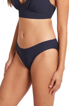 These bikini bottoms offer a comfortable and chic fit thanks to supportive powermesh lining. Powermesh lining Moderate back coverage 85% recycled polyester, 15% elastane Hand wash, dry flat Imported Sporty Stretch Swimwear In Polyamide, Compressive Solid Swimwear In Polyamide, 4-way Stretch Swimwear With Moderate Back Coverage, Seamless Nylon Swimwear With Minimal Stretch, Seamless Polyamide Swimwear For Sports, Blue Compressive Seamless Swimwear, Compressive Solid Color Polyamide Swimwear, Seamless Minimal Stretch Nylon Swimwear, Compressive Seamless Blue Swimwear