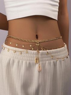 Gold Belly Chain This delicate Waist Chain adds a touch of elegance to your summer look. Perfect as a Christmas or Birthday gift, it's also a great accessory for beach days and festivals. Elevate your style with this twist on classic body jewelry - a versatile addition to your collection. Gold Belly Chain Aesthetic, Gold Body Accessories, Seashell Body Chain, Waist Chain Ideas, Seashell Waist Chain, Belly Chain Gold, Belly Chain Outfit, Belly Necklaces, Waist Chain Outfit