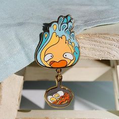 Howl's Moving Castle Calcifer Bacon Enamel Pin – FloralFrolicFoxes Howl's Moving Castle Calcifer, Mini Mundo, Bacon Eggs, Art Outfit, Enamel Pin Collection, Howl's Moving Castle, Bag Pins, School Accessories, Cool Pins