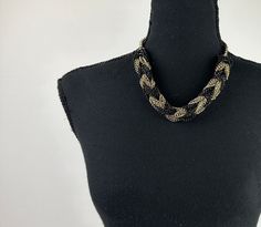 "THE DETAILS: Gold and black in color, multiple individual chains gathered and twisted, adjustable, heavy but slinky  ~ Era: 90's ~ Material: Metal ~ Condition: Good, no flaws - ready to wear MEASUREMENTS (Flat Lay): ~ Width 1/2\" ~ Length 19\" *COMPARE PERSONAL MEASUREMENTS FOR PROPER FIT - Ships quickly - Message with any questions - Shop with confidence -  Perfectly imperfect vintage charm may exist, but that's the sustainability appeal!" Black Chain Necklace Costume Jewelry, Elegant Black Rope Chain Necklace, Vintage Black Chain Necklace With Adjustable Chain, Black Chain Link Necklace For Party, Black Chunky Chain Choker Necklace, Handmade Black Chain Necklace For Party, Adjustable Black Beaded Chain Necklace, Vintage Black Chain Necklace For Party, Black Multi-strand Chain Necklace