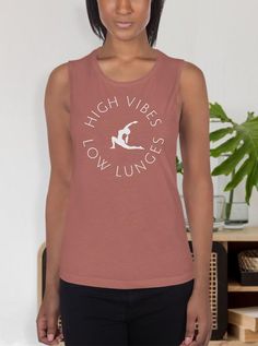 This comfortable High Vibes Low Lunges muscle tank is soft and flowy with low-cut armholes for a relaxed look. The casual ladies' muscle yoga tank top comes in multiple base colors and two font colors, so choose your fav (double-check the size chart) and treat yourself (or someone else) to this must-have top. Stay seriously comfy and stylish in this fun yoga women's tank. Perfect for before or after your next yoga class. Material & specs: * 65% polyester, 35% viscose * Athletic Heather is 52% polyester, 48% viscose * Black Heather is 80% rayon, 20% polyester * Fabric weight: 4.2 oz/y² (142 g/m²) * Relaxed fit * Low cut armholes * Curved bottom hem * Side seams This fun women's yoga tank top is made especially for you when you place your order, which is why it takes us a bit longer to deliv Yoga Tank, High Vibes, Yoga Tank Tops, Women Humor, Yoga Women, Low Cut, Tank Tops Women, Womens Clothing Tops, Fabric Weights