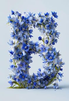 the letter b is made up of blue flowers