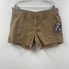 Hurley Brown Mid Rise Raw Hem Cargo Shorts Junior Size 7 New With Tags Attached Cotton Bottoms With Built-in Shorts And Cutoff Shape, Mid-rise Cotton Shorts With Pockets, Relaxed Fit Mid-rise Cotton Shorts, Casual Mid-rise Cotton Shorts, Cotton Bottoms With Built-in Shorts, Distressed Shorts, Cargo Shorts, Mid Rise, Size 7