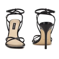 The strappy Tidle ankle strap sandal is an ultra sexy update to an essential dress shoe. The sky high stiletto heel is paired with a modern square toe and multiple criss-crossed skinny straps.