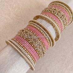 A Pair of 2 medium Sized stacks of luxurious antique Gold bangles with pretty pink shades, finished with beautiful intricate detailed Champagne Crystal bangles and pearl details. This will make the perfect stack for any Bride or those wanting to make a statement. Pair this with our Rubal Choker Set. Sold as a set for both arms only. Ready to Ship! Antique Gold Bangles, Cristal Champagne, Bridal Survival Kit, Bangle Box, Hand Harness, Bridal Choker, Bridal Necklace Set, The Bangles, Thread Bangles