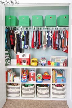 the closet is full of toys and books for children to play with, while storage bins hold their own items