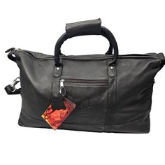 This Premium Designer Duffle Bag Is Made Of Full Grain Cowhide Leather With A Solid Pattern In Black. It Features Gcg Embossed Customization, A Canyon Outback Falls Product Line, And A Variety Of Convenient Features Such As Lined Interior, Bottom Studs, Inner Pockets, Detachable And Adjustable Straps, And Multiple Pockets. The Bag Is Perfect For Travel, Casual, Formal, And Business Occasions, And Has A Size Of 22 X 14 X 8 Inches (Width X Height X Depth). The Bag Is Adorned With A Sony Pictures L Black Travel Bag With Top Handle And Luggage Sleeve, Black Travel Bag With Luggage Sleeve And Top Handle, Black Top Handle Travel Bag With Luggage Sleeve, Black Duffle Bag With Top Handle And Luggage Sleeve, Black Top Handle Duffle Bag With Luggage Sleeve, Black Leather Duffle Bag With Top Handle, Black Leather Top Handle Duffle Bag, Black Rectangular Soft Leather Weekender Bag, Black Travel Bag With Top Handle For Business Trips