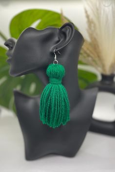 Fun yarn tassel earrings in the color saint patty green. Pair features silver plated fishhook (nickel free) and 100% acrylic yarn. Pair measures approximately 4 inches (top to bottom) of tassel. Lightweight and perfect for any occasion. These are handmade, so each earring has it's own unique shape and structure. Yarn Tassel Earrings, Yarn Tassel, Saint Patties, Fish Hook, Tassel Earrings, Acrylic Yarn, Jewelry Earrings Dangle, Tassels, Silver Plated