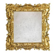 a gold framed mirror on a white background