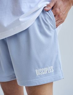 Keep cool and move freely. Made from an ultra breathable 150 GSM polyester mesh, our new active short features deep pockets, an adjustable waistband, and a 5" above-the-knee inseam.    "Therefore go and make disciples of all nations, baptizing them in the name of the Father and of the Son and of the Holy Spirit." -Matthew 28:19    Size:  Model is 5'11" and wearing a size Medium. Fit:  Relaxed, Unisex Fit Color: Skyride Composition: 100% Polyester Features:  Super Soft, Pre-Shrunk, Hidden Drawcor Make Disciples Of All Nations, Elevated Faith, Go And Make Disciples, Matthew 28 19, Matthew 28, Mesh Short, Shorts Sweatpants, Mesh Shorts, The Holy Spirit