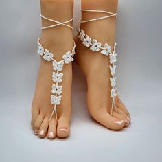 "One pair of crochet butterfly barefoot sandals. Made to Order - Choose your color. Great for beach or outdoor weddings (\"something blue\"), bridesmaids gifts, yoga, luau parties, pool parties or just to make your feet look pretty. Wear them anywhere, anytime, with or without shoes. Made to Order One size fits most adults  Handmade with 100% Mercerized Cotton Thread Hand wash cold - lay flat to dry If you would like a different color than offered or an adjustment in size, please \"Contact\" me. Crochet Open Toe Adjustable Barefoot Sandals, Adjustable Crochet Barefoot Sandals With Open Toe, Crochet Adjustable Open Toe Barefoot Sandals, Crochet Adjustable Barefoot Sandals, Adjustable Crochet Barefoot Sandals For Beach, Summer Crochet Sandals For The Beach, Handmade White Barefoot Sandals For Beach, White Crochet Sandals For Beach, Ankle Wrap Sandals As Summer Gift