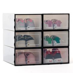 four clear drawers with six pairs of shoes in them