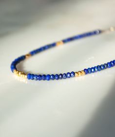 Lapis Gold Vermeil Necklace, Delicate Blue Beaded Necklace, Short Gemstone Color Block Necklace , Lapis Layering Necklace, Lyra - Etsy Puerto Rico Elegant Sapphire Faceted Beaded Necklaces, Adjustable Faceted Blue Crystal Necklace, Blue Faceted Round Bead Necklaces, Sapphire Faceted Beads Jewelry Gift, Sapphire Faceted Beaded Necklace For Gift, Faceted Sapphire Beaded Necklace Gift, Gold Lapis Lazuli Necklace With Faceted Beads, Gold Lapis Lazuli Faceted Beads Necklace, Blue Faceted Necklaces With Round Beads