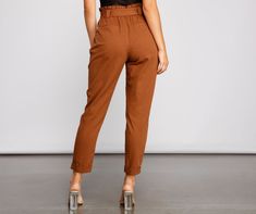 Keep on trend with tapered pants that are perfect to take you from day to night! The pants feature a high rise paperbag waist. a tie-waist belt. a double row slide hook closure. hidden zipper. slant pockets. faux back pockets. and a tapered leg. The pants are composed of a twill knit fabric that offers a form hugging fit with minimal stretch. Complete look with a bodysuit and mules.Fit & Features High rise paperbag waist Removable tie-waist belt. belt loops Double-row metal slide hook closure. h Homecoming Outfits, Paperbag Pants, Metal Slide, Selling Clothes, Tapered Pants, Keep On, Trendy Dresses, Waist Belt, Tapered Legs