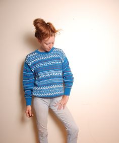 90s knit sweater MATERIAL 100% cotton MAKER: Colours by Alexander Julian made in the USA CONDITION great vintage condition SIZE medium model is 5'6'' bust 33in. waist 27in hips 35in. Blue Retro Winter Sweatshirt, Retro Blue Winter Top, Retro Fair Isle Pattern Winter Tops, Cotton Fair Isle Pattern Top For Fall, 90s Style Relaxed Fit Fall Sweater, Winter Cotton Top With Fair Isle Pattern, Cotton Fair Isle Winter Tops, Cotton Fair Isle Pattern Tops For Winter, Winter Fair Isle Pattern Cotton Tops